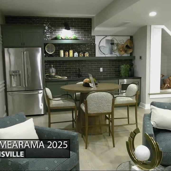 Keith Kaiser gets a look at the den area at a Homearama 2025 house
